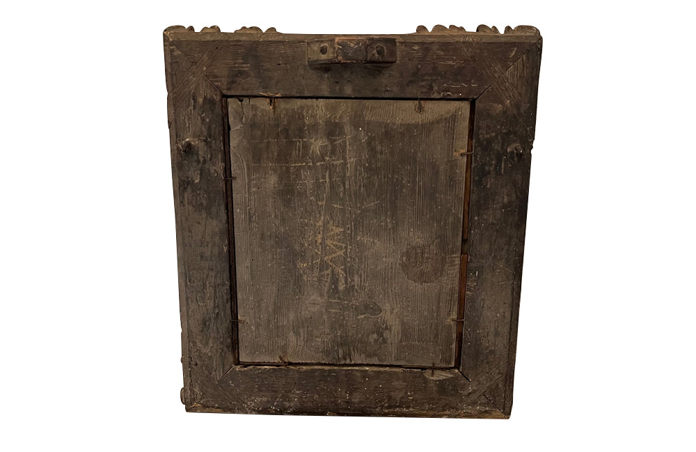 Beautiful early 18th Century French carved gilt wood cushion mirror with foxed glass