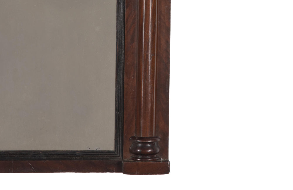 Early 19th Century French mahogany framed mirror with reeded interior band, turned side columns and roundels.