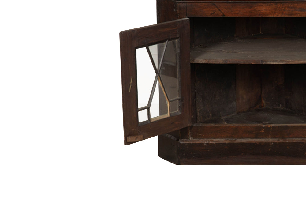 19th century, English, two piece oak corner cupboard with glazed astragal doors to top and bottom 