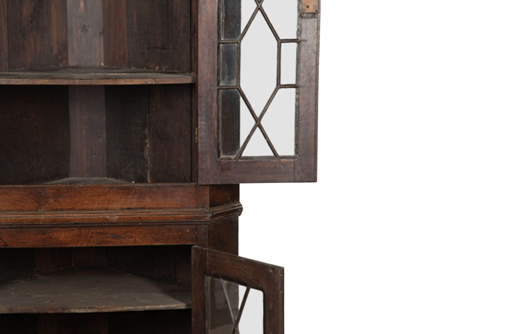 19th century, English, two piece oak corner cupboard with glazed astragal doors to top and bottom 