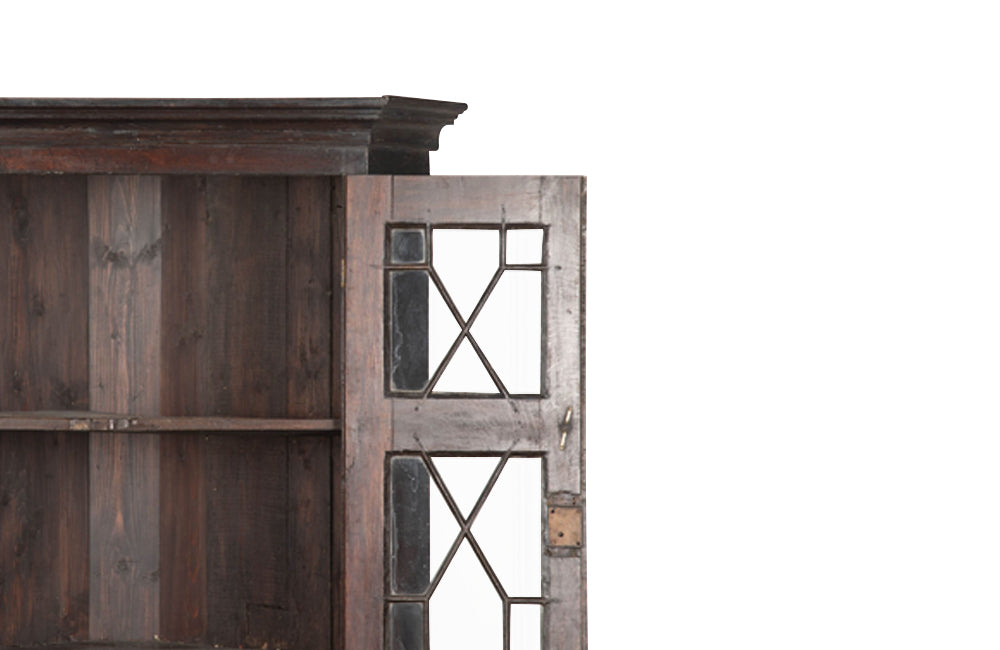 19th century, English, two piece oak corner cupboard with glazed astragal doors to top and bottom 