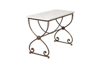 Beautiful 19th century French iron based table with lead medallions and ornamentation to arched stretcher and top of legs.