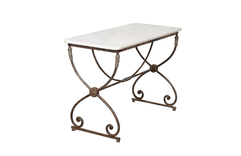 Beautiful 19th century French iron based table with lead medallions and ornamentation to arched stretcher and top of legs.