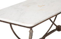 Beautiful 19th century French iron based table with lead medallions and ornamentation to arched stretcher and top of legs.