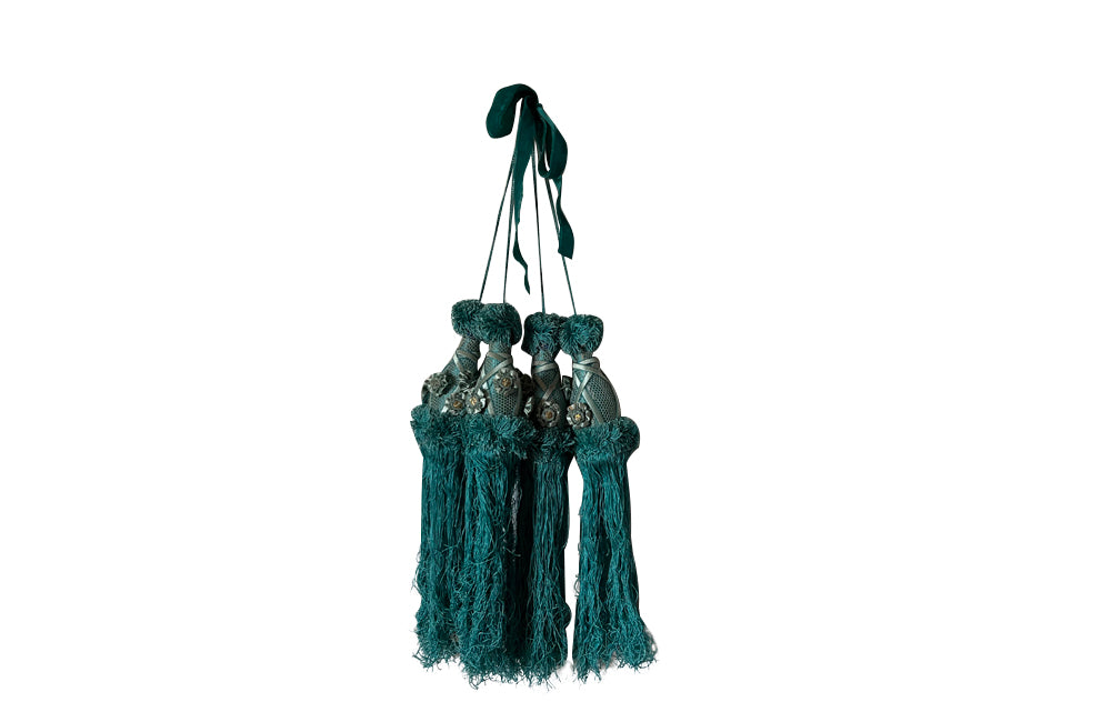 Set of four 19th Century French blue silk passementerie decorated with rosettes.