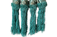 Set of four 19th Century French blue silk passementerie decorated with rosettes.