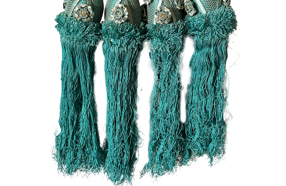 Set of four 19th Century French blue silk passementerie decorated with rosettes.