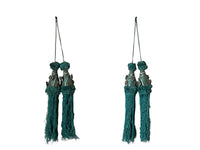 Set of four 19th Century French blue silk passementerie decorated with rosettes.