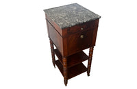 Antique side table  - Antique French Mahogany side table or nightstand with marble top and turned legs with brass sabots and casters.