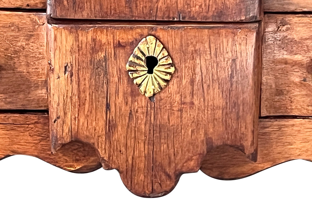 French 19th century walnut miniature chest of drawers with three drawers, brass handles, escutcheons and rings to feet and shaped marble top