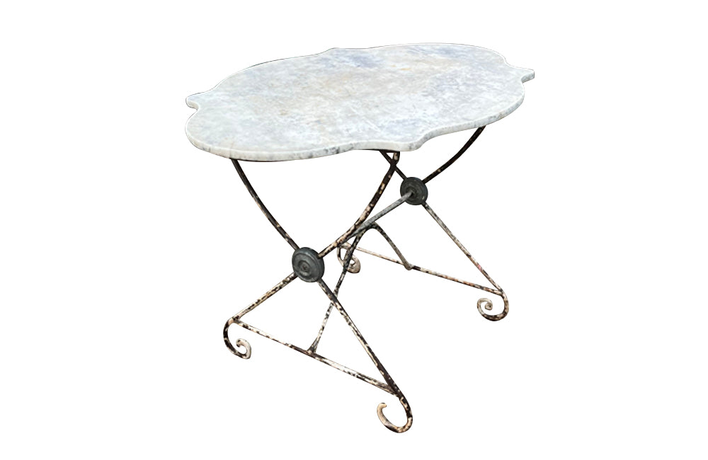 19th century French , iron based orangery table with shaped top.