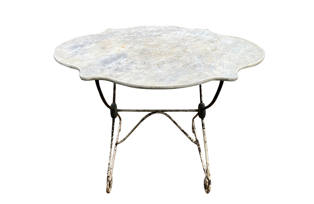 19th century French , iron based orangery table with shaped top.
