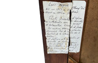 Antique oil painting 19th Century French of wine, a pottery jug a pipe tobacco garlic, radishes, bread and a sausage unwrapped in its paper.