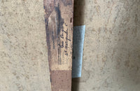 Antique oil painting 19th Century French of wine, a pottery jug a pipe tobacco garlic, radishes, bread and a sausage unwrapped in its paper.