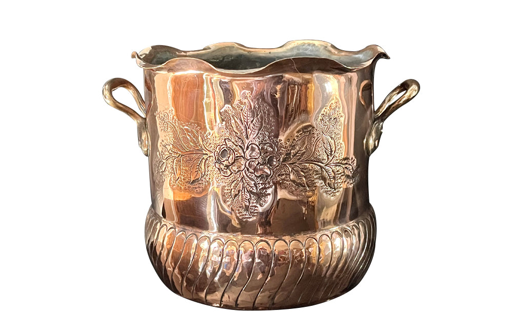 Large 19th Century French two handled copper vasque featuring a pretty fluted rim