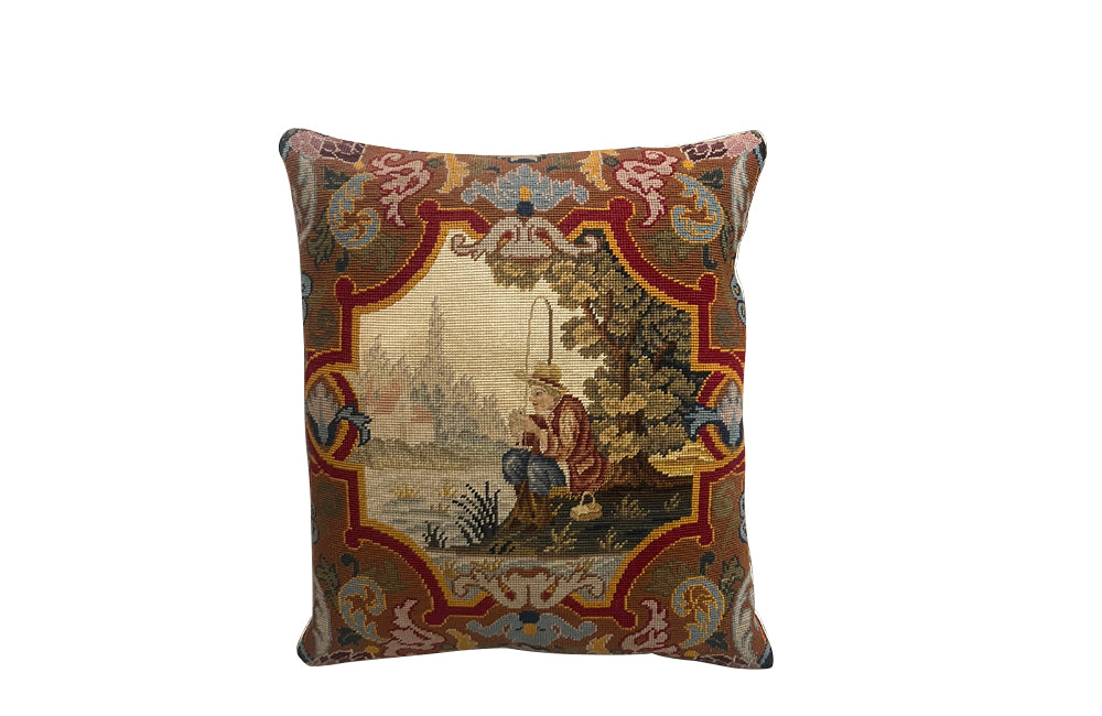 Antique cushion French tapestry cushion Depicting a fisherman in his straw hat, he sits on the banks of a river admiring his catch. To his side is a lidded basket. 19th century. French antiques.