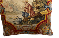 Antique cushion French tapestry cushion Depicting a fisherman in his straw hat, he sits on the banks of a river admiring his catch. To his side is a lidded basket. 19th century. French antiques.