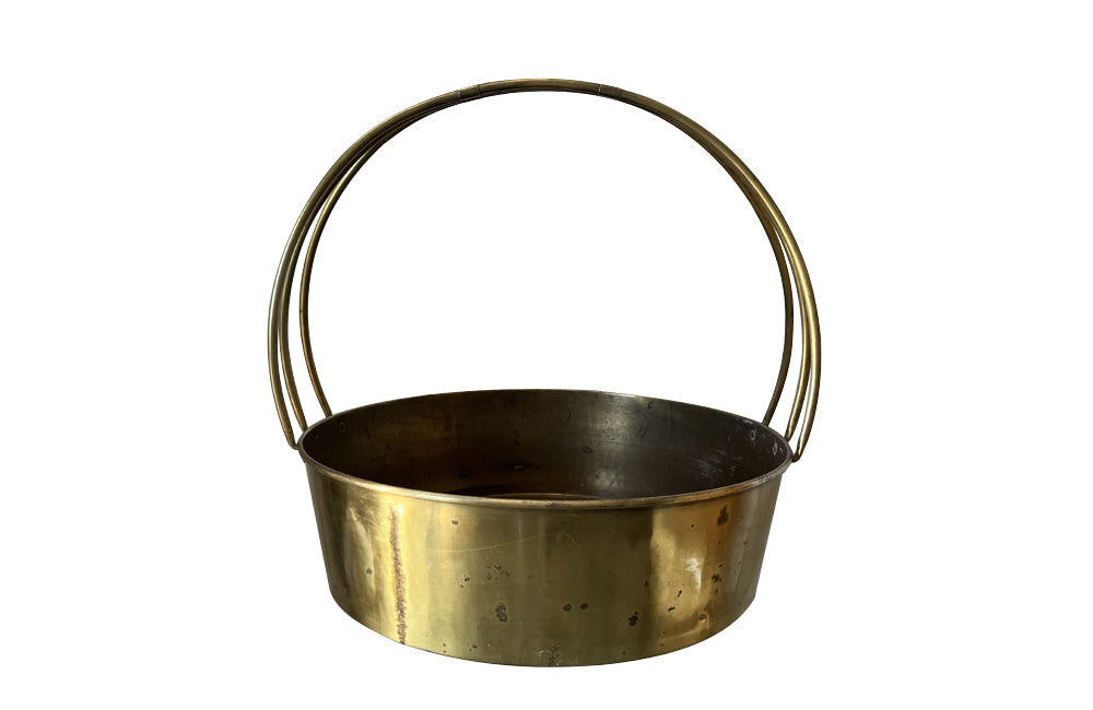 20th Century round basket of large proportion with triple band handle.