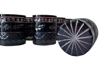 Set of eleven cut deep red glass whisky glasses.