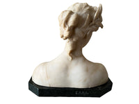 20th Century marble bust of a serene young woman with laurel wreath in hair and fine robe.