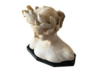 20th Century marble bust of a serene young woman with laurel wreath in hair and fine robe.