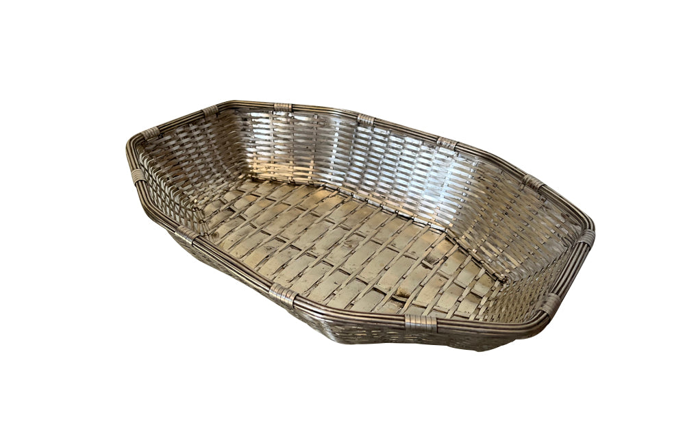 French silverplate woven bread basket in octagonal form.