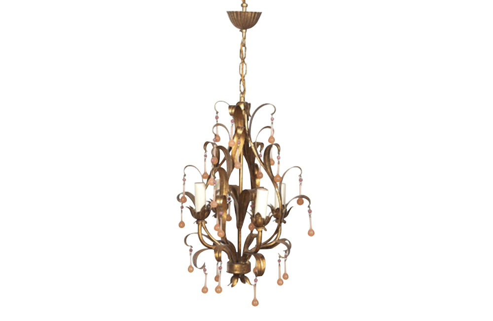 20th century charming gilt metal French chandelier with foliate decoration and peach pink drops.