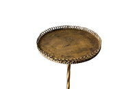 Spanish, gilt iron martini table with decorative coiled rim top, twisted stem and shaped tripod base with arrow point feet.