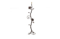 decorative wrought iron floor lamp in the form of a climbing flowering plant