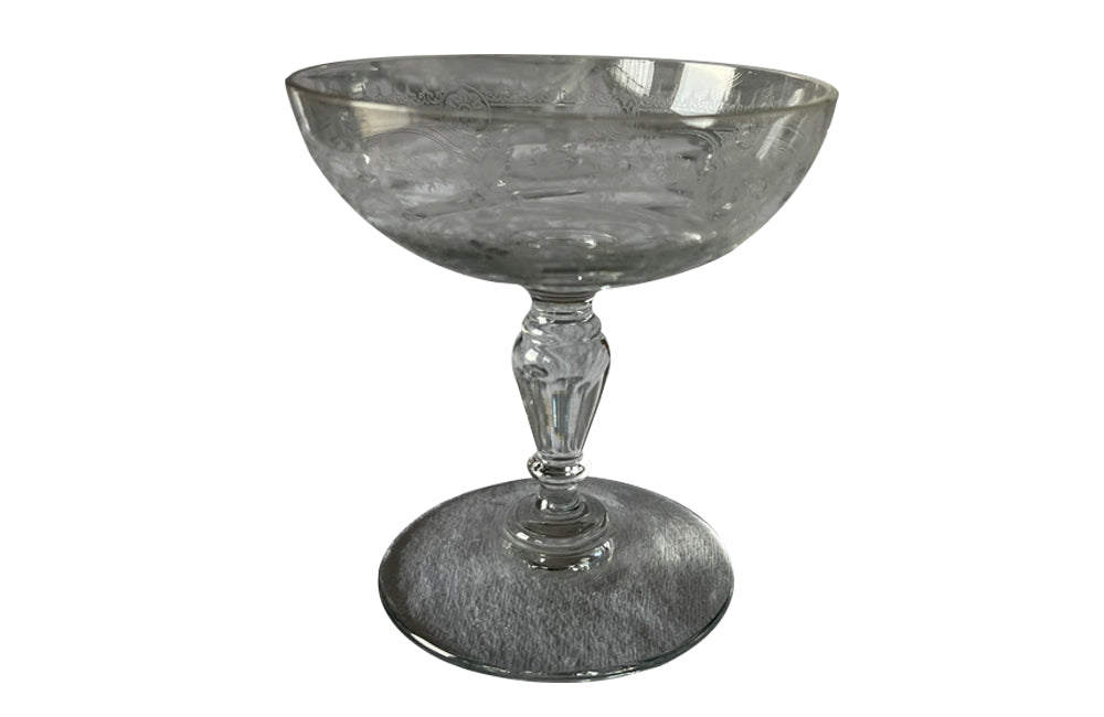 Beautiful set of 11 French champagne coupes decorated with a neo-classical etched design featuring galands of flowers.  c.1900