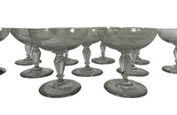 Beautiful set of 11 French champagne coupes decorated with a neo-classical etched design featuring galands of flowers.  c.1900