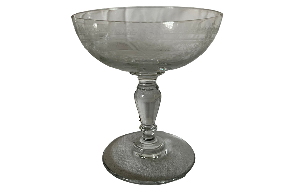 Beautiful set of 11 French champagne coupes decorated with a neo-classical etched design featuring galands of flowers.  c.1900