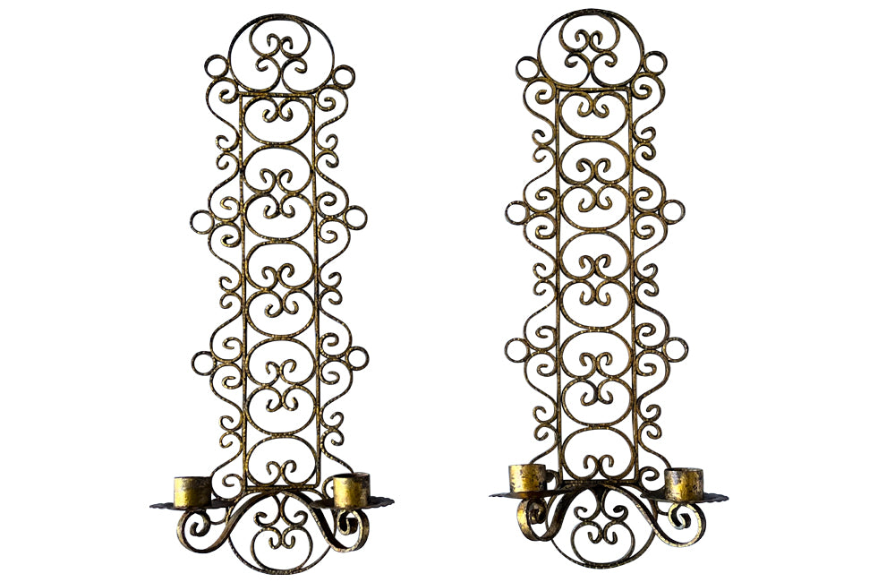 Pair of mid 20th Century Spanish gilt scroll work iron wall sconces.