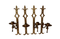 Set of 20th century Spanish decorative four gilt iron wall appliques.