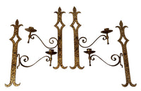Set of 20th century Spanish decorative four gilt iron wall appliques.
