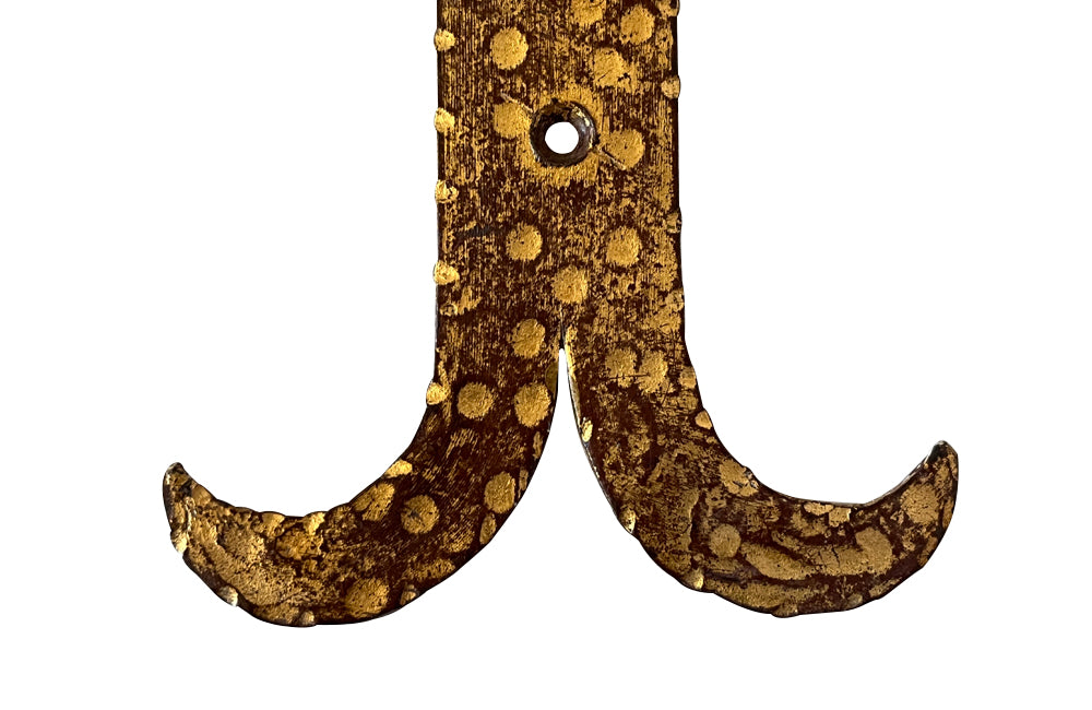 Set of 20th century Spanish decorative four gilt iron wall appliques.