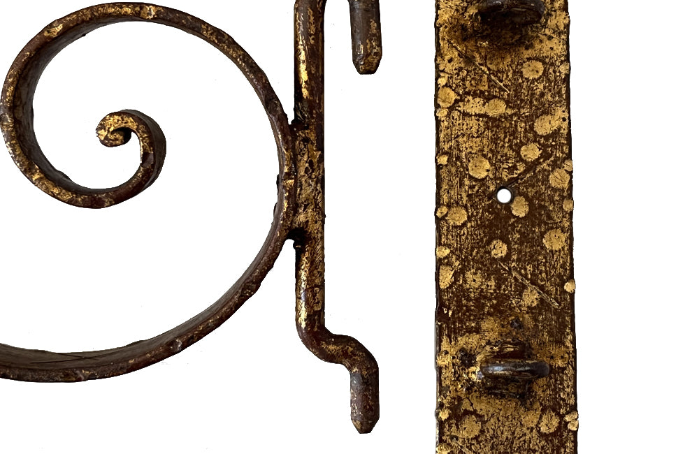 Set of 20th century Spanish decorative four gilt iron wall appliques.