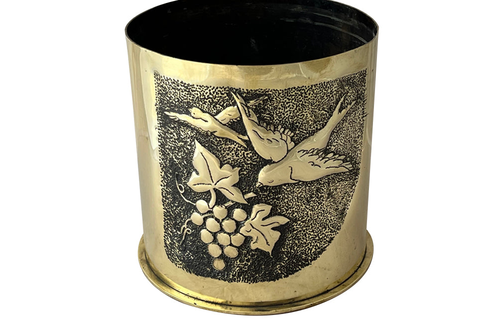 Antique brass shell casing dating to the First World War and fashioned into a wine cooler or cache pot.