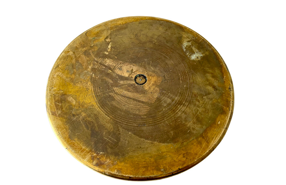 Antique brass shell casing dating to the First World War and fashioned into a wine cooler or cache pot.