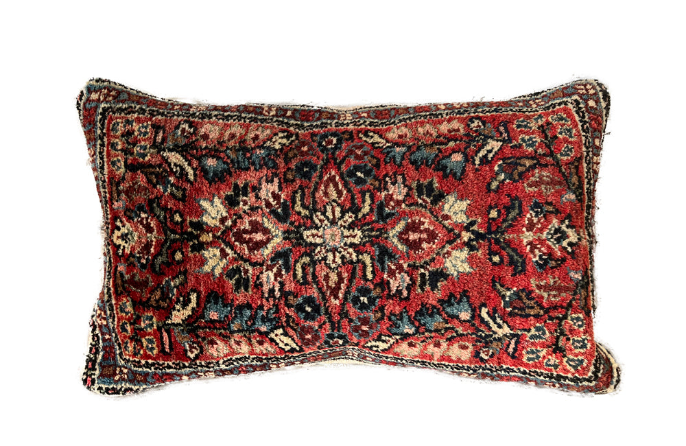 Feather filled, cushion made with early 20th Century carpet and antique hemp.