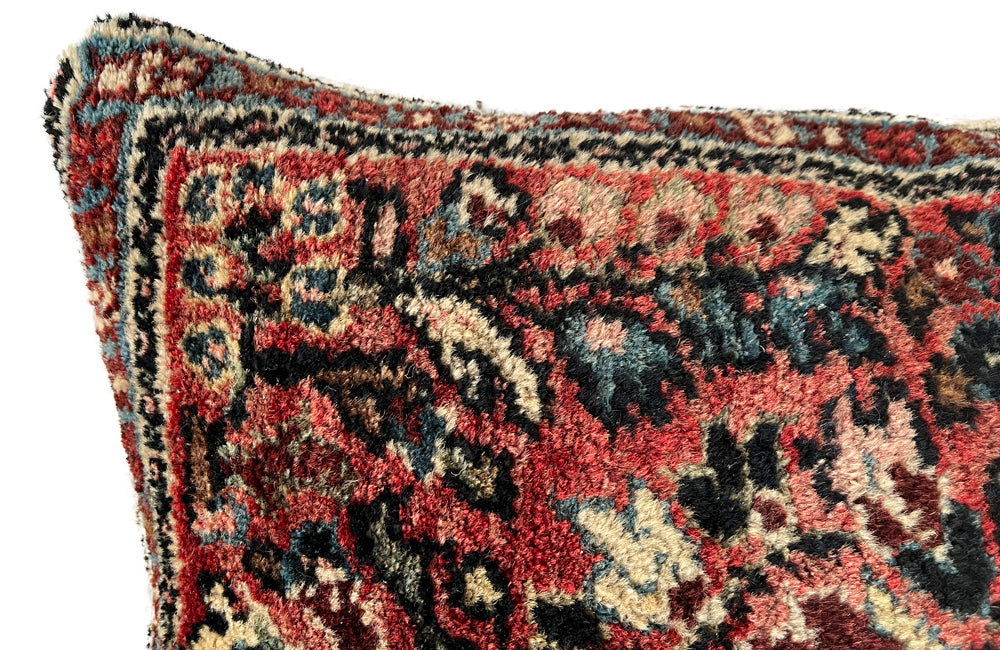 Feather filled, cushion made with early 20th Century carpet and antique hemp.