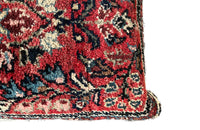 Feather filled, cushion made with early 20th Century carpet and antique hemp.
