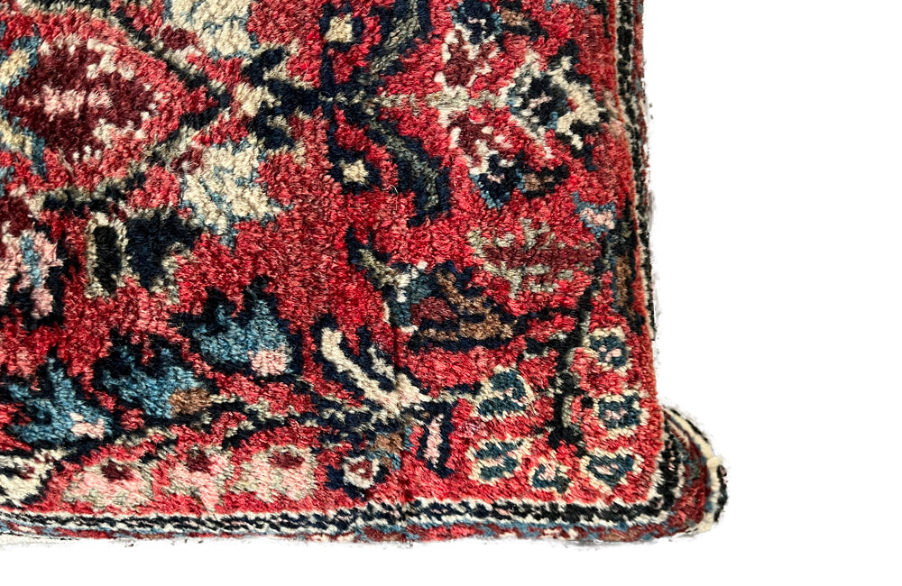 Feather filled, cushion made with early 20th Century carpet and antique hemp.