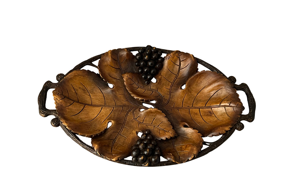 Carved oval wooden tray in the form of two vine leaves with bunches of grapes - decorative antiques