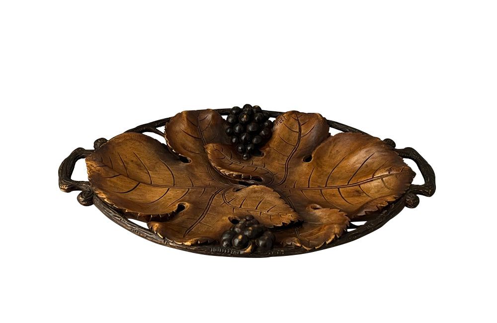 Carved oval wooden tray in the form of two vine leaves with bunches of grapes - decorative antiques