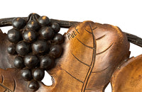 Carved oval wooden tray in the form of two vine leaves with bunches of grapes - decorative antiques
