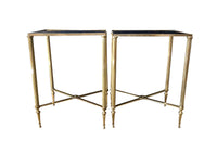 Pair of 20th century elegant brass end tables in the Maison Jansen style with black glass tops