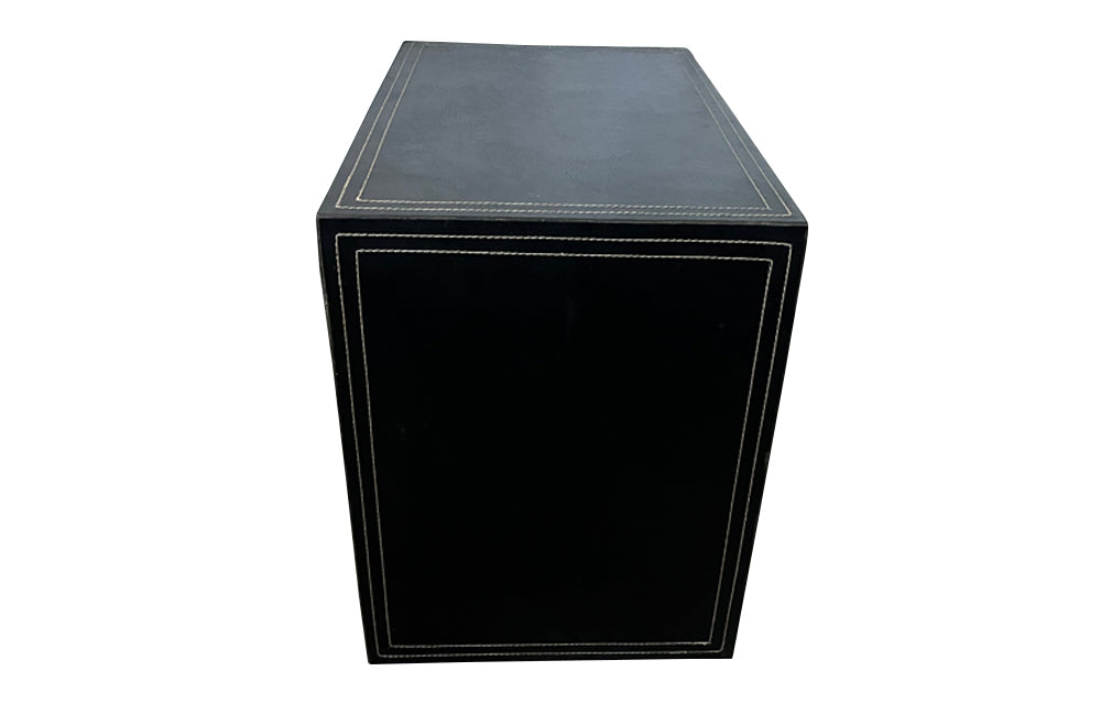 20th century stitched black leather occasional table or stool in the manner of Jacques Adnet.