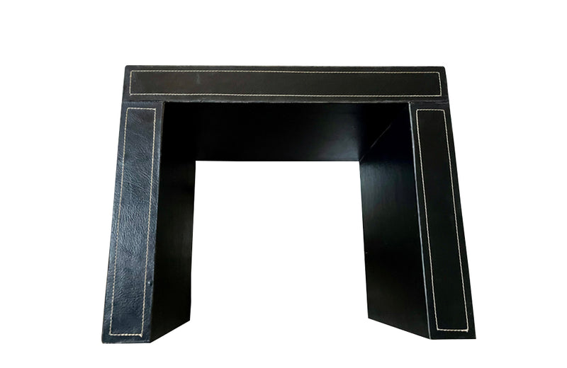 20th century stitched black leather occasional table or stool in the manner of Jacques Adnet.