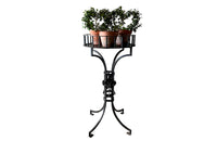 Tall black iron Art Deco plant stand in the manner of Edgar Brandt. Rose ornamentation to all sides of support. Circa 1930